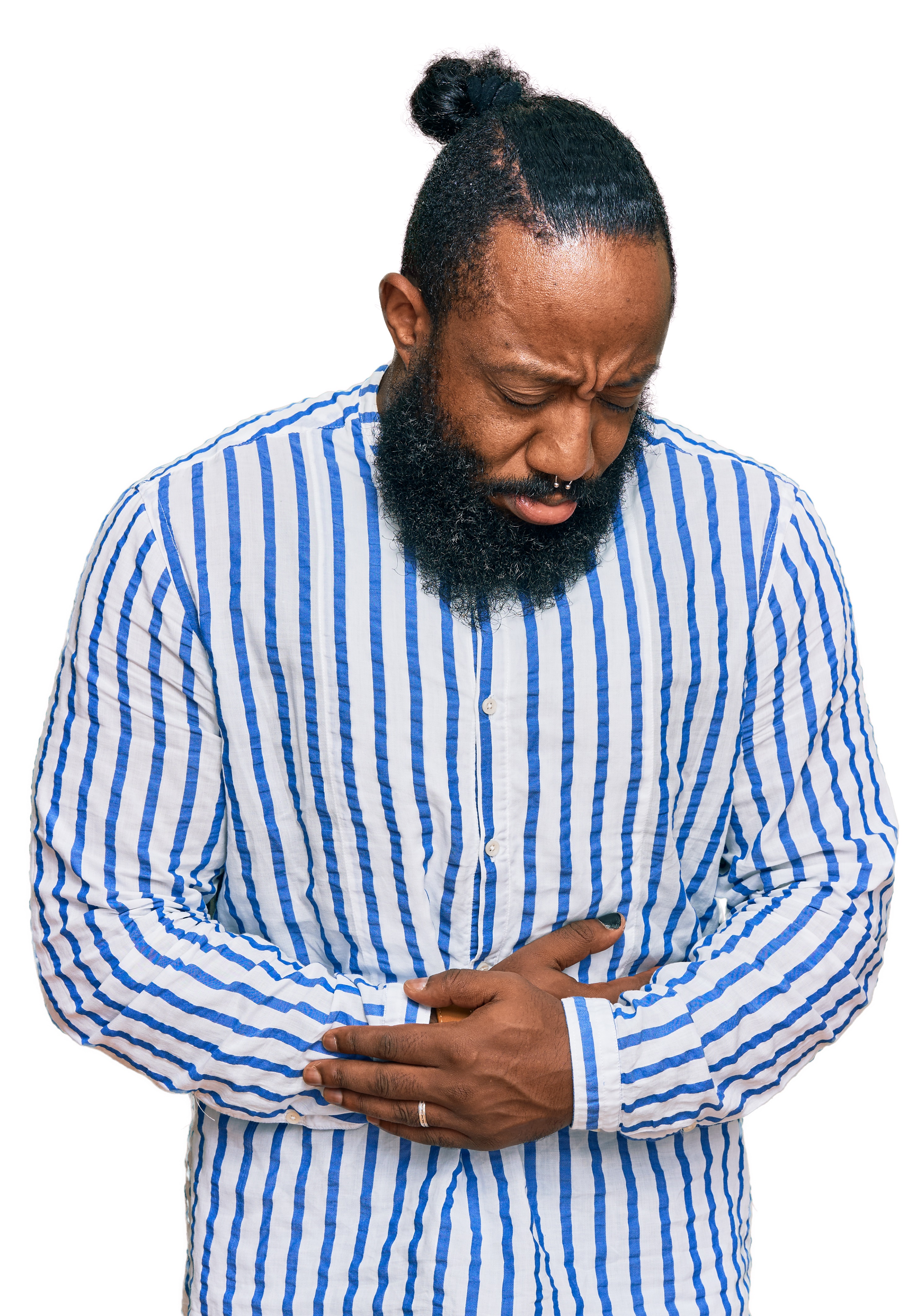 A young black man in business shirt holding tummy in apparent show of tummy ache
